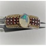 Silver ring with opal 8x6mm and garnets; 3.45g; size R1/2