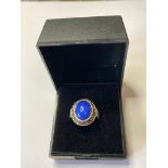 SILVER RING HAVING ROYAL BLUE GEMSTONE IN CABOCHON FORM WITH SILVER MARCASITE SURROUND, SIZE L1/2