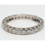 Diamond full eternity ring (tested 18ct gold), weight 2.27g and size J