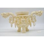 A Bone Chinese Hand Carve Pot 3 Legs with Double Dragon Heads. Width:37cm. 17cm Height (1.1kg)
