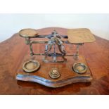 Wooden based vintage postal scales platform style. W 19 cm x H 10 cm