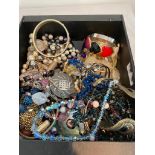 Box of costume jewellery full of necklaces, bangles and bracelets etc