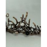 tiara with black rhinestones and faux pearls;