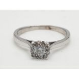 9k white gold stone set ring, weight 1.97g and size L