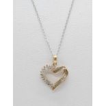9ct gold diamond heart pendant on 46cm long 9ct gold chain, weight 2.2g and pendant 17mm long approx
