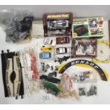 An interesting box of Scalextric parts including five or six cars, a control tower, C451 fuel tanks,