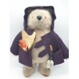A Gabrielle design Paddington Bear with half eaten marmalade sandwich and duffle coat (missing one