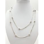 Long silver ball necklace, 90cm long and weight 18.07g approx