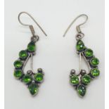 Pair of silver stone set earrings having circular and pear shaped green diopside coloured stones