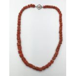 Vintage coral necklace with pearl and silver clasp , weight 33.17g and 46cm long approx