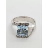 18ct white gold diamond & Aquamarine ring, weight 8.3g AND SIZE O, stone is 8x8mm approx