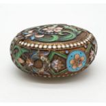 Russian gilt enamel pill box with fitted lid surrounded by seed pearls and colourful enamel, 5cm