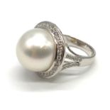 A large Kimoto pearl (17mm diameter) ring set in diamond and 18ct white gold ring, weight 14.43g and