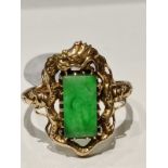 18k yellow gold antique ring with centre emerald and dragon design surround, adjustable finger size,