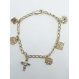 Silver gilt (gold plated) charm bracelet with 6 stone set charms, weight 8.21g and 18cm long approx