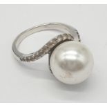 Silver ring with oversized 'pearl' to top and zirconia feature to shoulders, 925 silver original