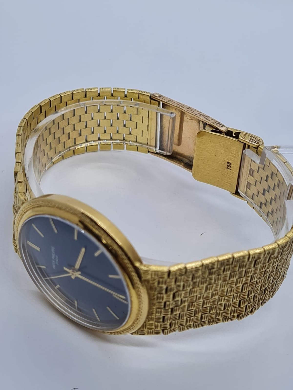 PATEK PHILIPPE GENEVE gent watch with blue face and 18k gold strap,36mm case 1970s model - Image 10 of 17