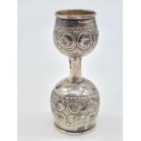 Unusual White Metal Double Goblet. Both Goblet are having Floral Design. Weight: 48.4g. Height:10cm