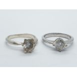 2x round cut stone set silver rings, weight 5.1g and size K and M1/2 (2)