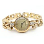 18ct gold Tudor vintage ladies watch, diamonds on each side of face, comes with safety chain and