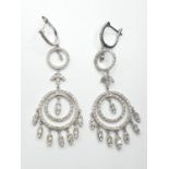 Pair of 18ct white gold and diamond drop earrings in the shape of dream catchers, weight 15.82g