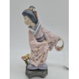 Lladro figure of a Japanese lady, 21cm tall.