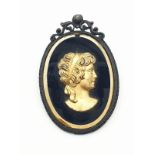 1950's Exquisite black brooch with gold coloured cameo. 25.2g, length 5cm.