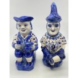 Pair of Delft blue TOBY JUGS. 34cm tall. one hat with slight damage. 2.115Kg and 1.946kg