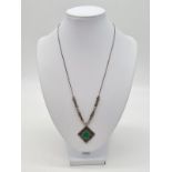 Vintage emerald silver pendant set on 48cm long silver necklace, weight 13.86g and pendant 3cm