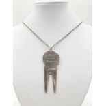 Large silver tooth pendant (dated 1999) on a 70cm long silver chain, weight 30.53g and pendant