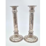 A Pair of Column Candle Stick. 925 Sliver. Weight:1.25kg. 20cm Height. 9cm Diameter at Base.