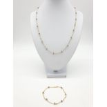 14ct gold brown diamond and pearl necklace with matching bracelet, total weight 5.6g and over 9ct