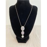 Silver chain and silver and mother of pearl pendant, pendant having three graduated ovals in drop