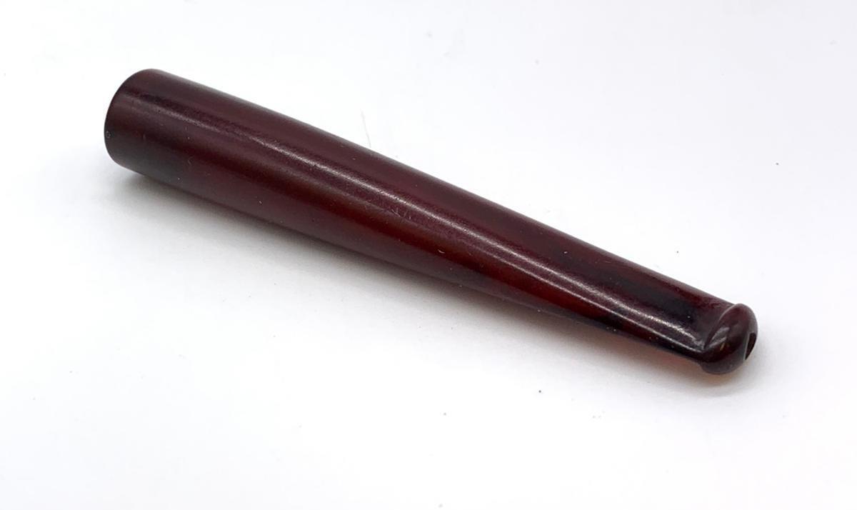 A late Victorian or Edwardian cherry amber (real amber, not bakelite) smoking pipe for cigarettes or