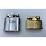 2 x Ronson Vintage Petrol LIGHTERS 1st Ladies gold tone having floral chasing to outer case 2nd