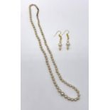 A truly vintage Arabian Sea pearls (individually knotted) with a 9 carat clasp and a pair of