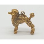 Yellow metal poodle pendant/charm, weight 8.1g approx