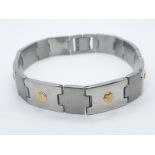 Gent bracelet set in stainless steel and 18ct gold studs, 21.5cm long approx