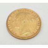 Gold sovereign dated 1885 with young Victoria head in good condition, 8g of 22ct gold