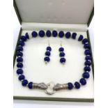 A vintage, gourd shaped, hand carved, Ceylon opaque sapphire necklace and earrings set with two