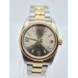 Rolex Oyster Perpetual chronometer ladies watch with silver face and gold bezel,26mm case two tone