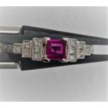 18k white gold ring with diamonds around 0.18cts and top quality ruby around 0.35cts; 2.67g; size N