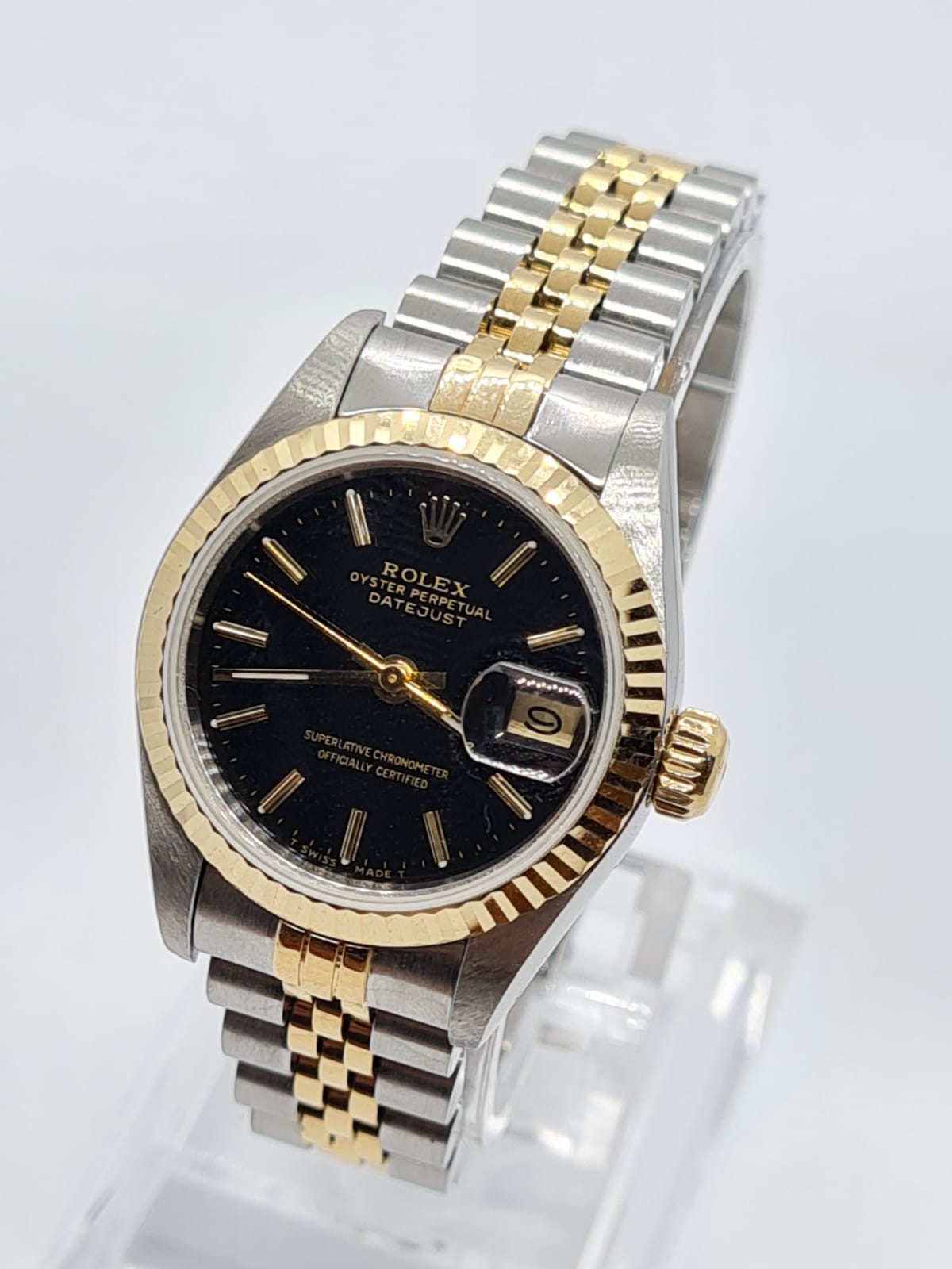 ROLEX Oyster Perpetual Datejust ladies watch with black face and two tone steel strap, 22mm case