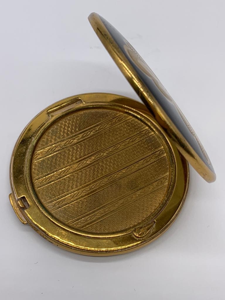 Vintage 1950/60's compact by Melissa. Black enamel lid with gold feature engine turned base. - Image 2 of 5