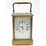 Brass Eight Day Mantle Clock with winding key - overwound , 13cms tall and 9x8cms
