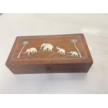 Antique wooden trinket box with ivory inlaid depiction of elephants and palm trees, 23x11.5cm approx