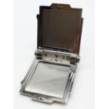 Unusual Dunhill travel Clock in folding case, in orginal packaging 5cm x 6cm