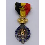 Vintage Belgium workers medal for 30 years of labour. Complete with ribbon and rosette.