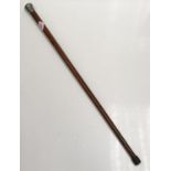 Antique 1914 solid dark oak walking stick with engraved silver handle. Embossed with the letters M.