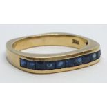 18ct Yellow gold sapphire set band ring. Weight 4.2g, Size K.